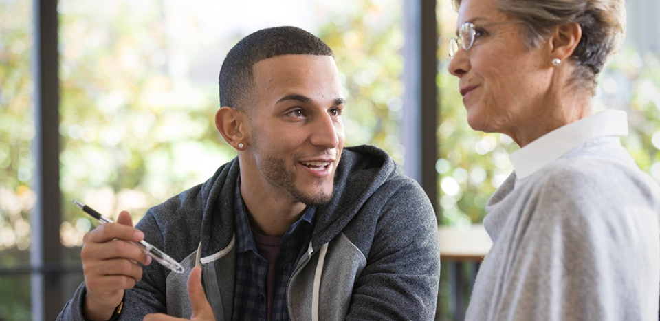 Man caring for older colleague