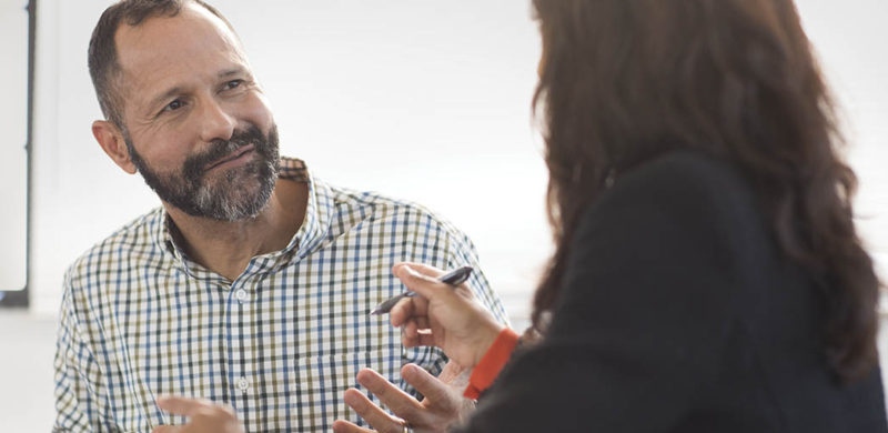 Employer talking to employee