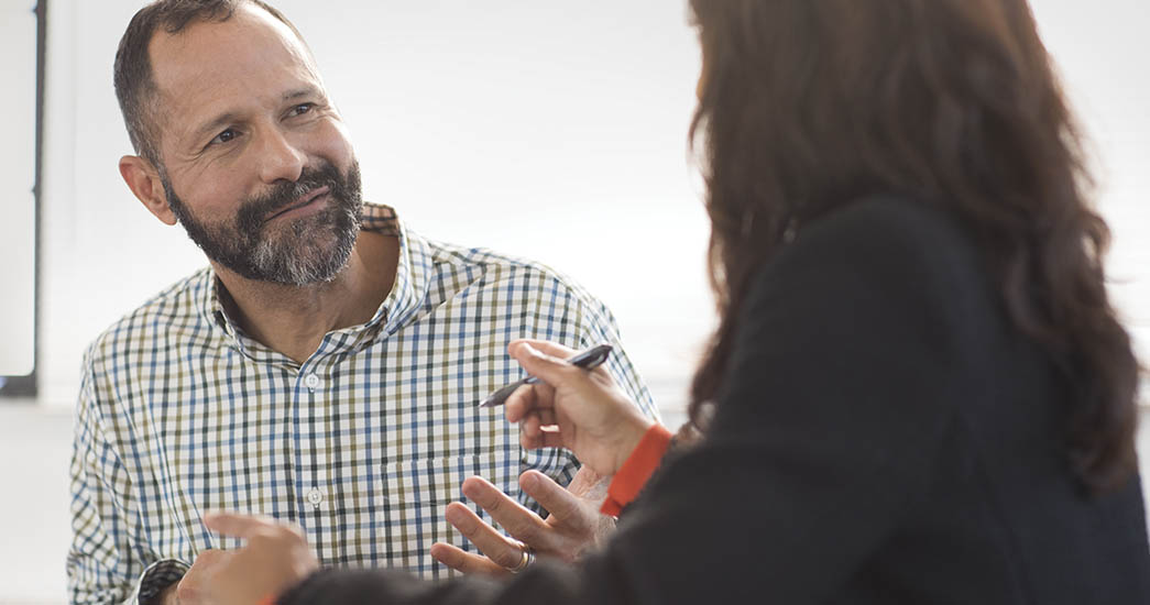 Employer talking to employee