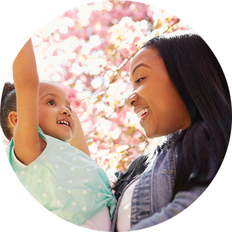 mom and child outside in the spring