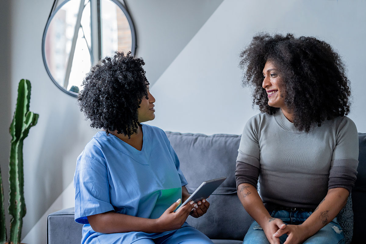 doctor speaking with patient