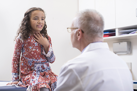 Doctor with young child patient